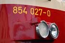 854.027